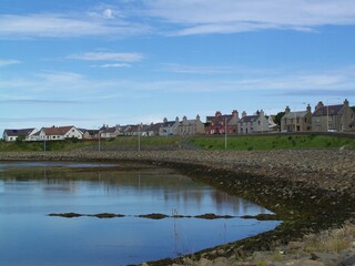 Fototapeta na wymiar Houses ot Kirkwall Waterfront, Orkney Islands, Scotland, United Kingdom