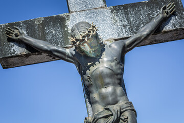 Jesus Christ crucified with crown of thorns sacrificed himself for us