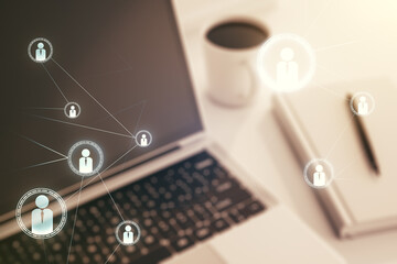Double exposure of social network icons concept with modern laptop on background. Marketing and promotion concept