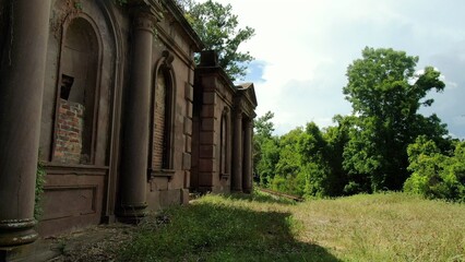 Fototapeta na wymiar Rose hill cemetery in Macon Georgia beside railroad tracks small southern town USA