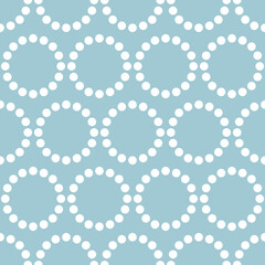 Seamless pattern with white dots and blue background