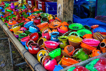 Mini kitchen utensils pottery toys made from clay that are painted in colorful colors so that they attract the attention of children buyers.
