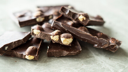 Pieces of black chocolate background