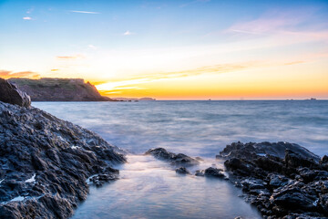 Obraz premium Sunset at the Manche sea, view from Saint-Malo of France 