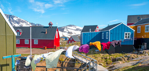 Picturesque village on coast of Greenland - Colorful houses in Tasiilaq, East Greenland © muratart
