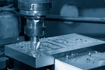 The milling process on NC milling machine.