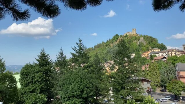 27-07-2022, Sestola, Italy - Sestola Castle in the province of Modena, Medieval castle. Panoramic view of the mountain village of Sestola