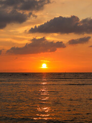 magical sunset with clouds over the ocean