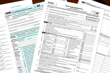 2022 IRS tax forms on a desktop. - obrazy, fototapety, plakaty