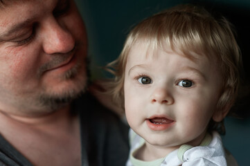 closeup portrait of dad and toddler
