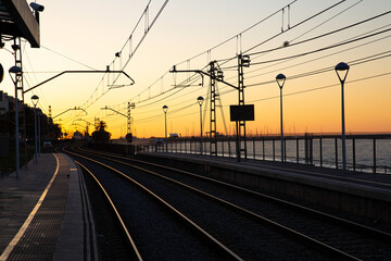 Fototapeta na wymiar sunrise at a train station in barcelona