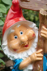 garden gnome in the flower bed macro