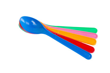 colorful plastic spoons for party isolated on white with clipping path