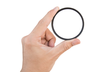 hand holding clear camera filter isolated on white with clipping path