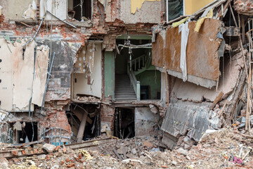 Fototapeta na wymiar Destroyed houses on the streets of Kharkiv. War in Ukraine