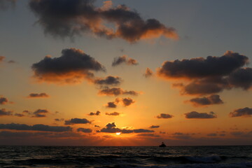 The sun sets below the horizon on the Mediterranean Sea in northern Israel.