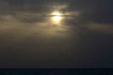 The sun sets below the horizon on the Mediterranean Sea in northern Israel.