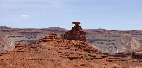 Fototapeta na wymiar American Landscape in the Desert with Red Rock Mountain Formations. Mexican Hat, Utah, United States of America.
