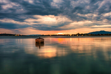 There are wonderful compositions with sunken boats at sunrise and sunset.