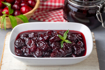 Jars with freshly homemade cherry jam, sour cherry jam, Turkish name; Visne receli