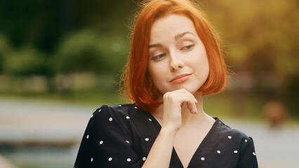 Caucasian thoughtful creative woman redhead young girl student thinking choose ponder planning...