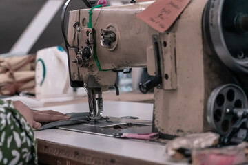 Old sewing machine in the workshop