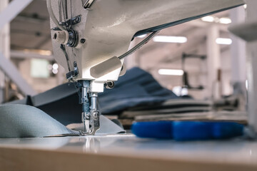 Sewing machine needles close-up in the workshop