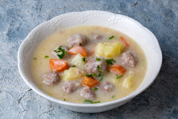 Seasoned soup with meatballs with vegetables. Turkish name; sulu kofte, eksili kofte, terbiyeli kofte)