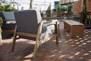 Patio. Garden. Urban, neutral, outdoor living space. Exterior photo. Outdoor living room with couch