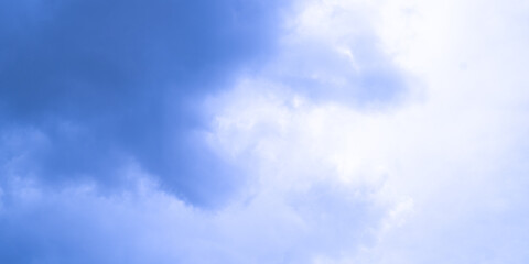 blurred background with blue sky with clouds