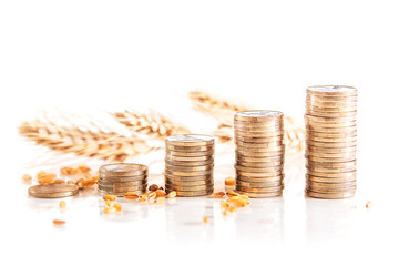 Coin towers showing the rise in the price of of wheat. Selective focus.