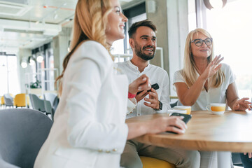 Obraz premium Having a break. Group of professional business people is in the office