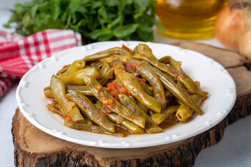 Traditional delicious Turkish food; Green beans with olive oil; Turkish name; Zeytinyagli taze fasulye