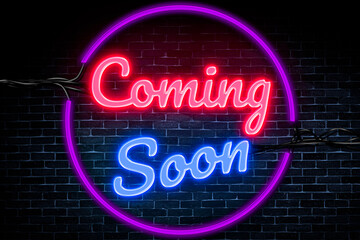 Coming Soon neon banner on brick wall background, and a light signboard.