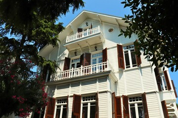  Old wooden summer cottages painted with white paint on the Princes' Islands
