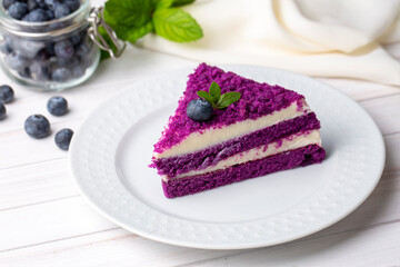A deliciously looking slice of purple velvet cake