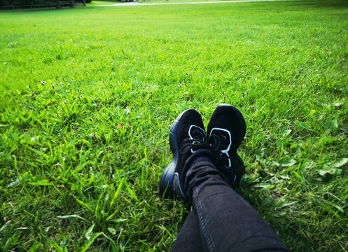 pair of shoes on grass, relaxing in the nature