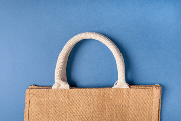 Fabric shopping bag on a blue background
