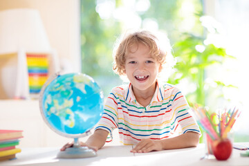 Kids doing homework. Children go back to school.