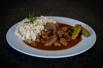 ready to eat - fresh venison goulash with rice and pickles
