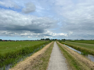 Path through farmland around Blessum