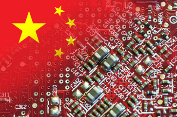 Flag of China on the components of an electronic board. China is one of the largest chip makers. Battle in the supremacy for the manufacturing of Microchips and Semiconductors in the world.