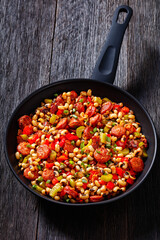 Hoppin John of black-eyed peas, veggies, sausages