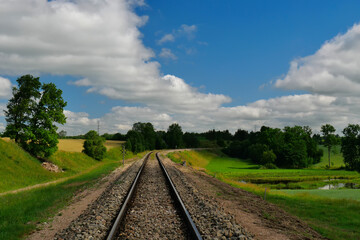 Fototapeta na wymiar Railroad tracks in the countryside