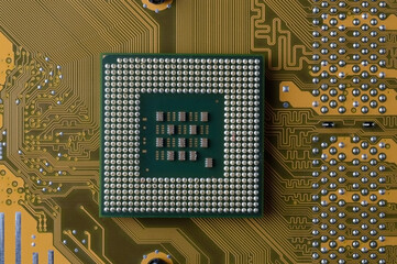 microprocessor from the computer lies on the motherboard. close-up. view from above