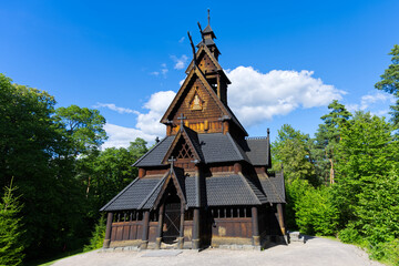 Wooden church “Gol Stave stavkyrkje” in the city of Oslo in Norway Europe on the island aerial view - obrazy, fototapety, plakaty