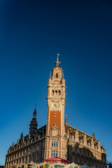 Fototapeta na wymiar european town of lille classical european building clock tower and city hall