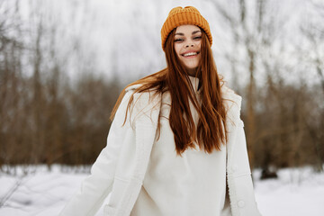 cheerful woman red hair walk in the fresh winter air winter holidays