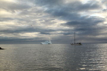 A sailboat anchored near Pond Inlet, Nunavut waiting for weather to transit through the Northwest...