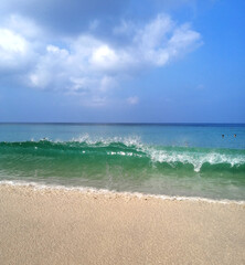 Fototapeta na wymiar Sea, wave and beach. Blue ocean waves sunlight. Place for text.